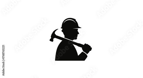 Silhouette of a construction worker with hard hat and hammer standing confidently ready for work