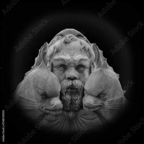 Ancient Triton Sculpture with Dolphins – Mythological Marble Fountain Detail on Black Background