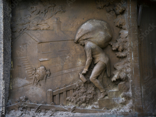 Bradford, West Yorkshire, England, United Kingdom, 25th October 2025, Detail of frieze on Statue of Samuel Lister in Lister Park