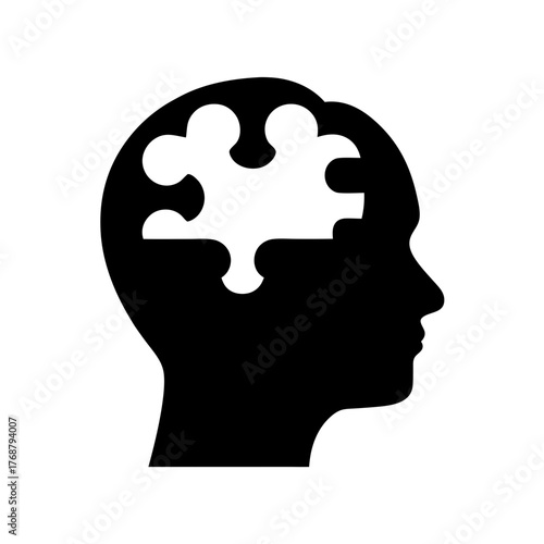 Silhouette of a head with a puzzle piece replacing part of brain