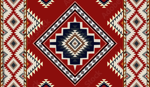 Seamless geometric ethnic pattern inspired by Native American tribal fabric. Traditional Aztec and Navajo style carpet and tile vector design on navy blue background. Perfect for textile, wrapping,