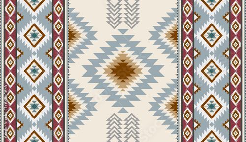 Seamless geometric ethnic pattern inspired by Native American tribal fabric. Traditional Aztec and Navajo style carpet and tile vector design on navy blue background. Perfect for textile, wrapping,