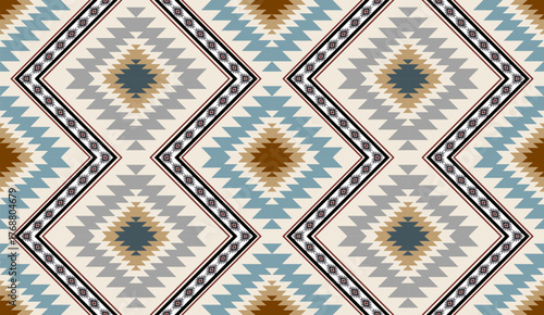 Seamless geometric ethnic pattern inspired by Native American tribal fabric. Traditional Aztec and Navajo style carpet and tile vector design on navy blue background. Perfect for textile, wrapping,