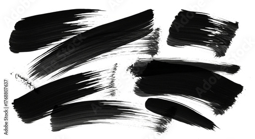 Black ink brush strokes, perfect for adding a bold and artistic touch to your designs, creating dynamic textures