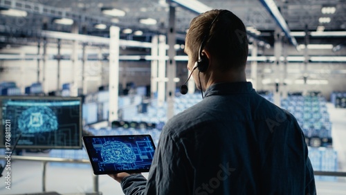 Data center engineer using AI on tablet to help clients resolve website hosting problems. Server hub tech support specialist helping users keep their online services running smoothly, camera B