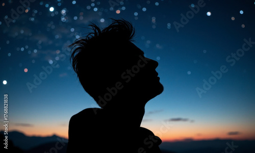 A Universe Within: The Silhouette of a Human Head Filled with a Starry Night Sky