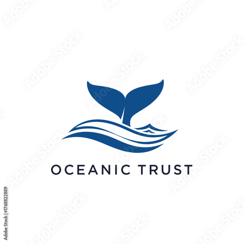 A blue whale's tail emerging from ocean waves. The text "OCEANIC TRUST" is displayed below