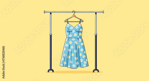 A daisy dress hangs on a rack set against a yellow background