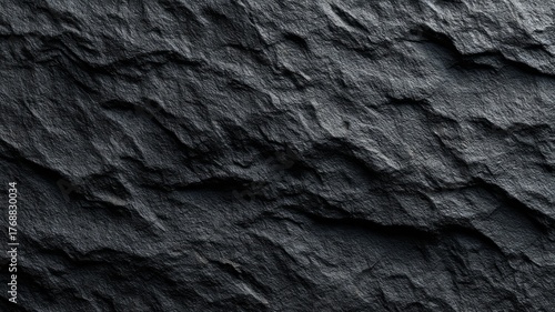 Close-up of dark slate stone texture showcasing natural roughness and subtle shading. Deep gray tones create rugged appearance. Unlit, enhancing surface detail. Neural network AI generated