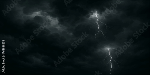Dramatic thunderstorm lightning illuminates the dark cloudscape at night
