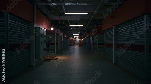 Empty Street Market Scene – Quiet atmosphere with cold artificial light and solitude.