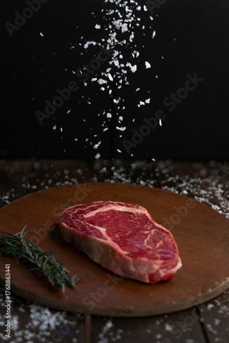 Raw Steak With Salt Floating