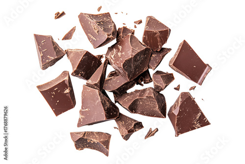 Dark chocolate chunks scattered isolated on a transparent background