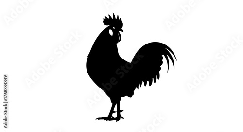A bold black silhouette of a rooster stands proudly against a stark white canvas, capturing the.