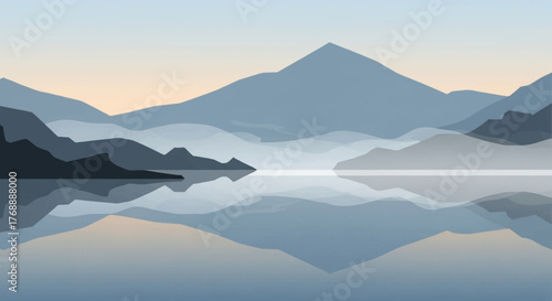Serene mountain range reflected in calm water at dawn.