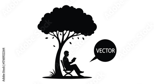 A person sits in a folding chair reading a book under the shade of a large tree silhouette