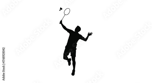 Dynamic silhouette of a male badminton player in mid jump hitting a shuttlecock with a racket