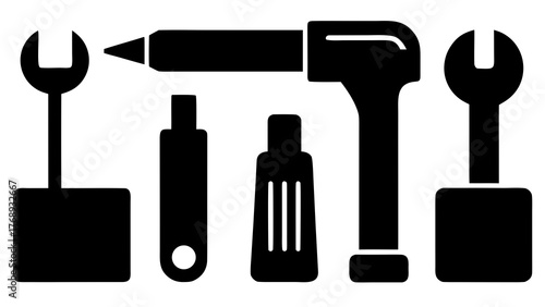 Black silhouette of tools including wrenches and a soldering iron on white