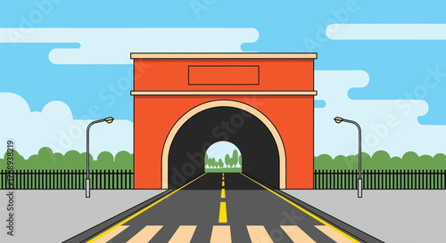 Straight road leading into a large, arched tunnel under a bright blue sky with clouds.