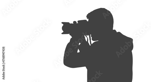 Silhouette of a professional photographer capturing a moment with a dslr camera in studio lighting isolated on white background