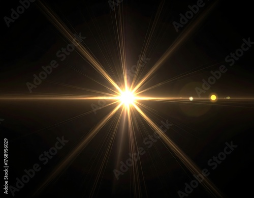 Central starburst emanating rays of light against a black backdrop