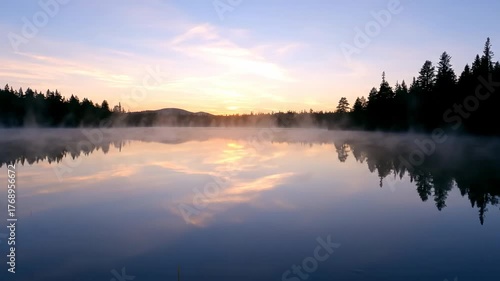 Wallpaper Mural Wide Shot of Gentle Mist Rising Over a Serene Lake at Dawn lake, beautiful, wilderness Torontodigital.ca
