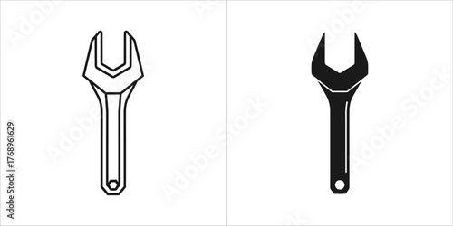 Illustration of an open end wrench in outline and solid style