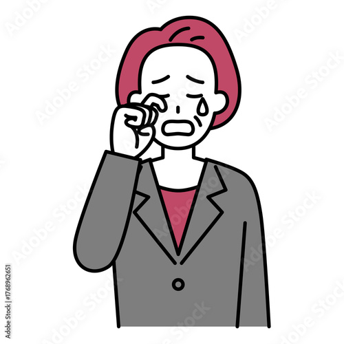 泣く中年のスーツの女性