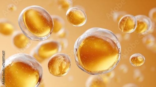 Bubbles floating in a warm, golden liquid against a soft background.