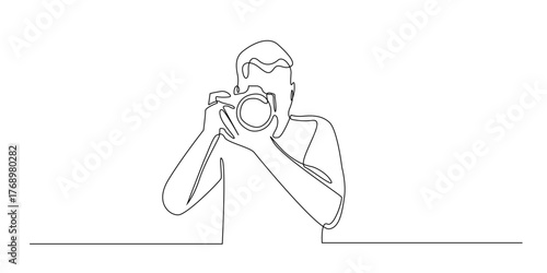 Continuous line drawing of a man holding a camera and taking a photo. Minimalist one line art representing photography, creativity, and capturing moments.