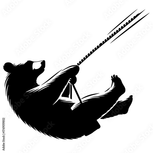 Silhouette portrait of a swinging bear