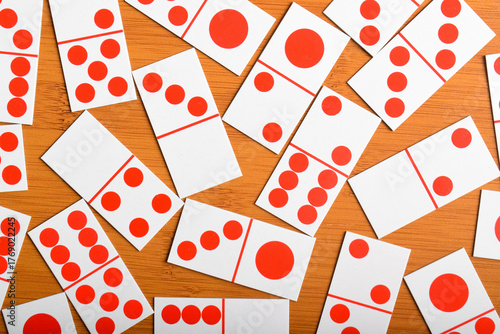 Domino card on wooden table background