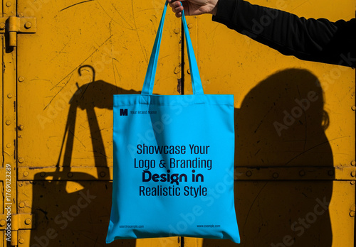 Hand Holding Tote Bag Mockup