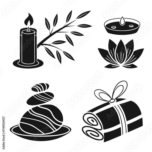 Spa still life with candle, bamboo, lotus and stones