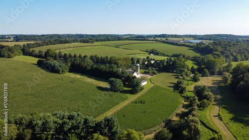 Tablou pe pânză aerial view of agricultural fields, barns and silos on farms in Cochranville, so