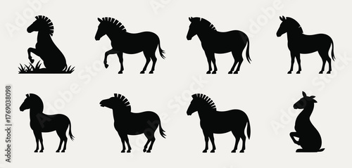 Collection of eight black horse silhouettes in various poses and actions