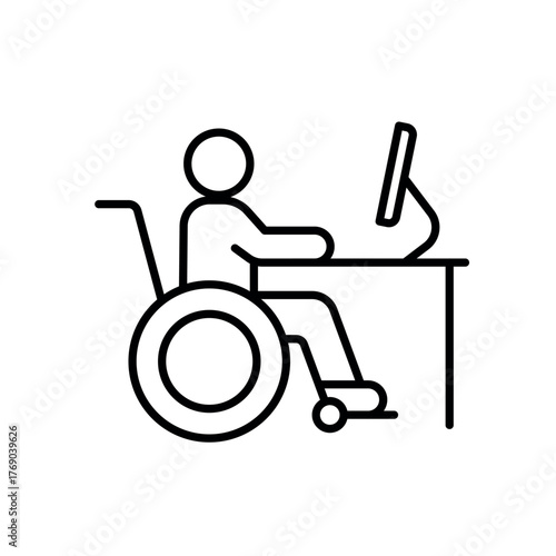 A person in a wheelchair using a desktop, showing inclusive tech and workplace accessibility.