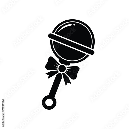 Black baby rattle with bow on white background infant