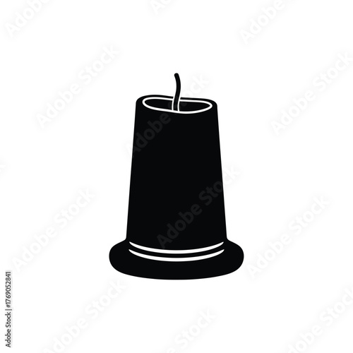 Black candle with white rim and wick object