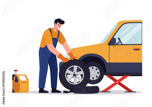 Mechanic changing a tire on a yellow vehicle. Suitable for automotive or repair service concepts. Job in action. Handyman working.