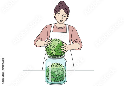 A woman prepares kimchi art in a jar. She?s focused, wearing an apron, and working with fresh cabbage. Clean, minimalist style.