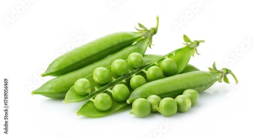 Fresh green peas in pods and shelled, isolated on white backdrop