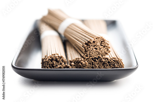 Buckwheat soba noodles isolated on white background.