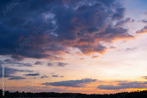  Sunset sky clouds in the Evening with Golden orange sunlight in golden hour, Dusk sky background