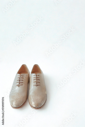 Wallpaper Mural Classic tan leather oxford shoes on a white background Torontodigital.ca