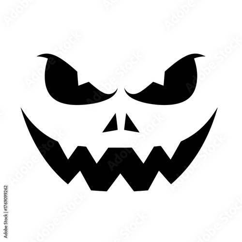 Scary jack o lantern face carved from a pumpkin