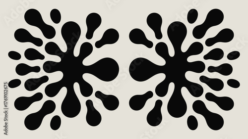 Two symmetrical black inkblot patterns on a light background creating a mirrored image effect design