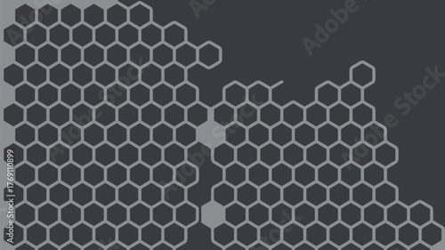 A grey scale image showing a honeycomb pattern with some missing sections and filled in cells too