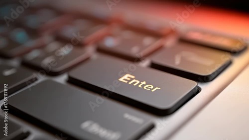 Finger pressing gold enter key on modern laptop keyboard represents decisive action. Pushing an important button on computer symbolizes online access with technology