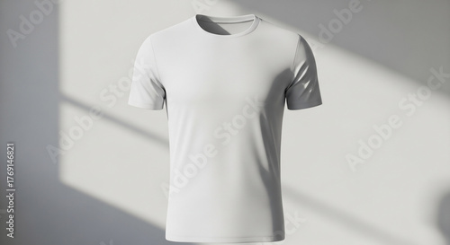 Minimalist Blank White T-Shirt Mockup Display with Natural Shadow on a Clean Wall